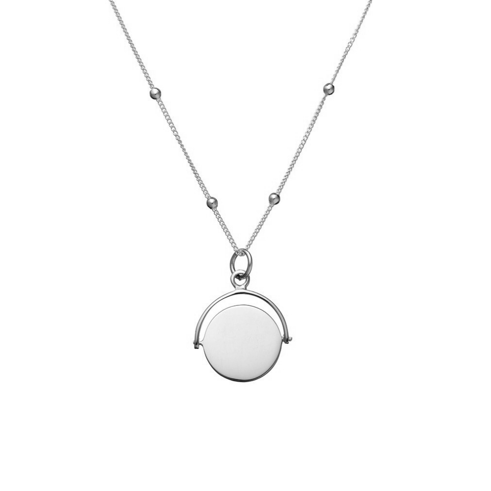 Sterling Silver Necklace Featuring Spin-Disc Pendant