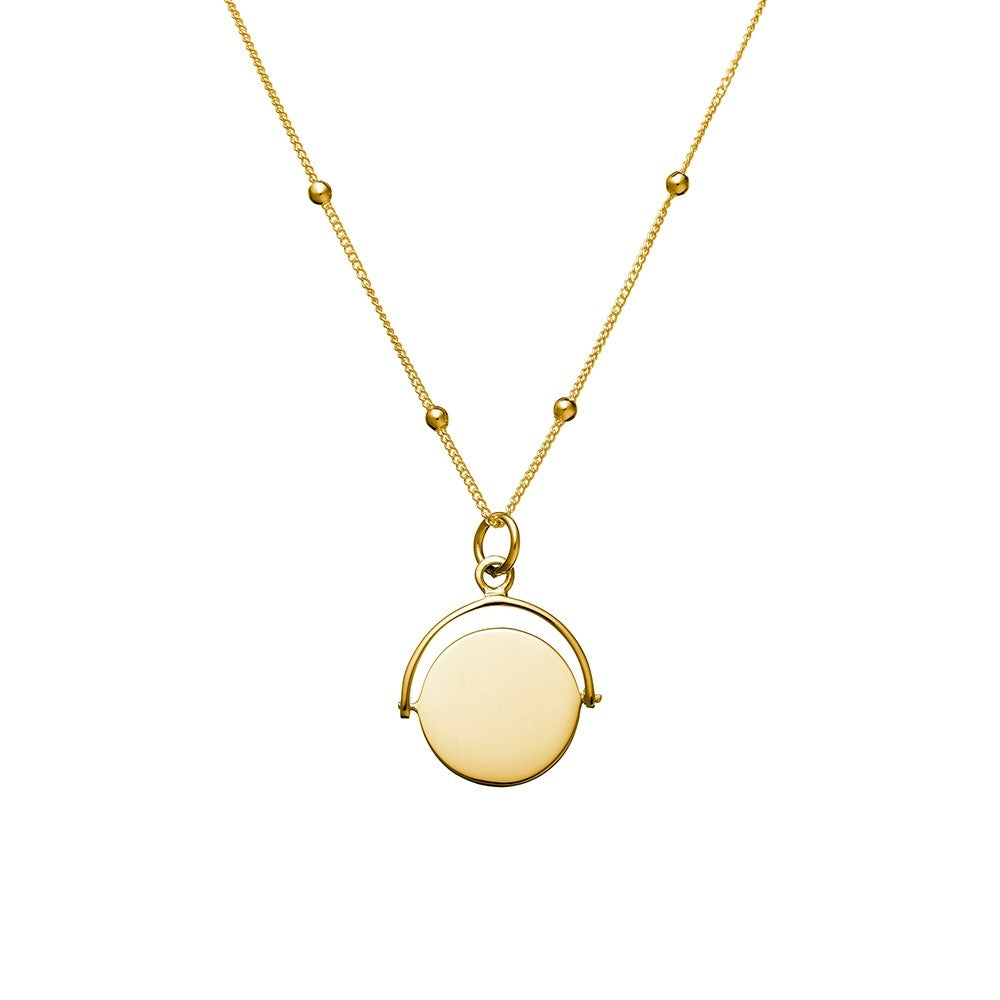 of pearl gold spinning disc necklace