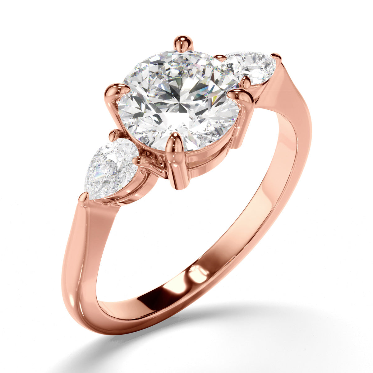 Round Brilliant Cut Diamond Trilogy Engagement Ring with Pear Sides